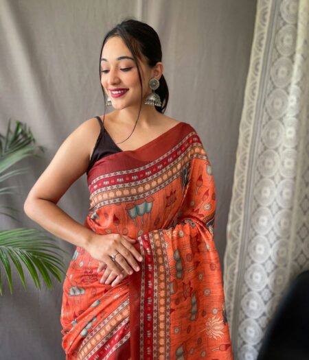 Women's Artistic Terracotta Orange Linen Saree with Kalamkari Inspired Print & Tassel Detailing – Perfect for Casual Festivities & Cultural Events